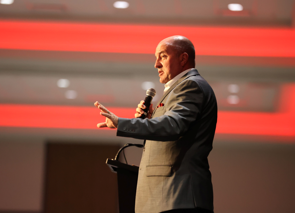 Husker Athletic Director Troy Dannen speaks to attendees at Governor’s Summit in Kearney.