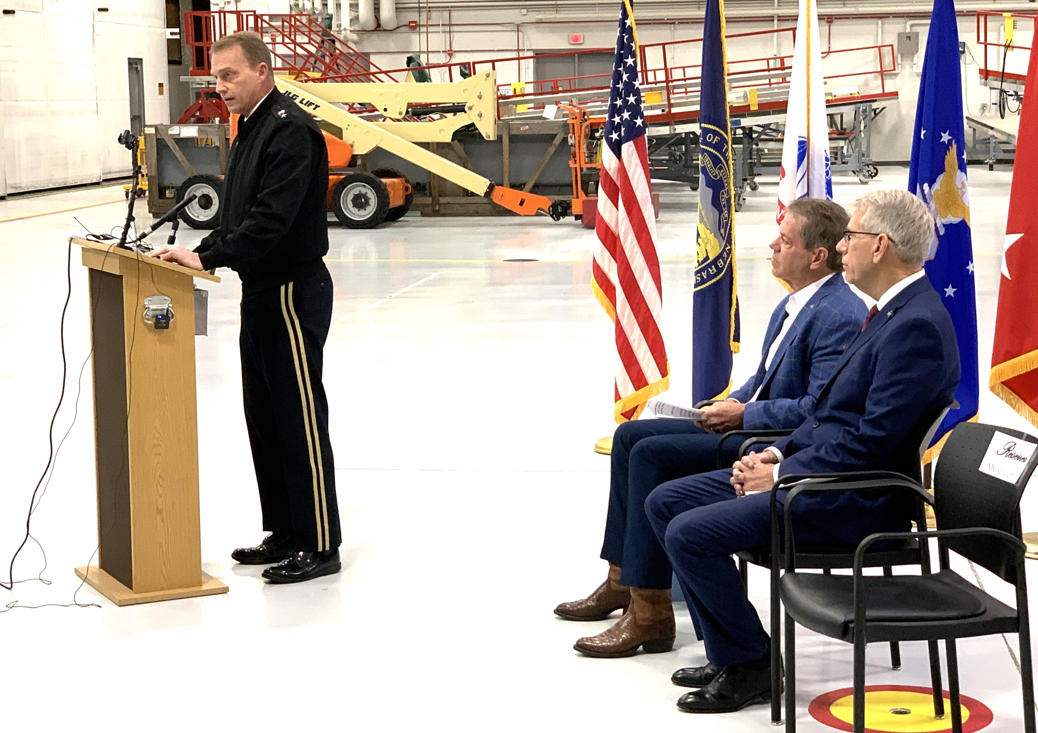 Governor Pillen and Lt. Governor Kelly watch on as Major General Craig Strong addresses the audience.