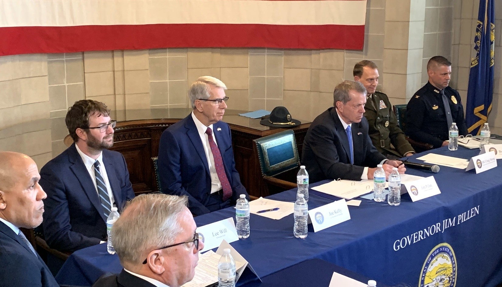Rob Jeffreys, Director Department of Correctional Services, Lee Will, Director Chief Operating Officer Department of Administrative Services, Lt. Governor Joe Kelly, Governor Jim Pillen, and  Major General Craig Strong, Adjutant General Military Department listen to a question at the open media Cabinet Meeting