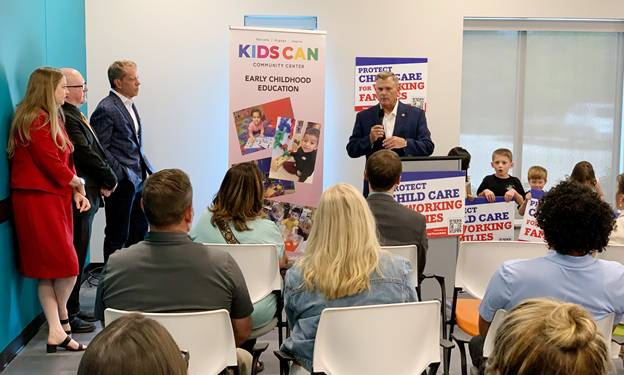 Senator Brad von Gillern speaks at the signing ceremony at the Kids Can Community Center in Omaha.