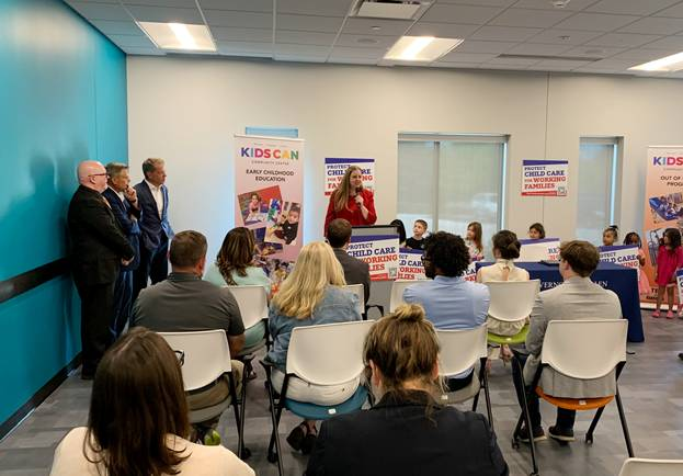 Senator Wendy DeBoer speaks at the signing ceremony at the Kids Can Community Center in Omaha.