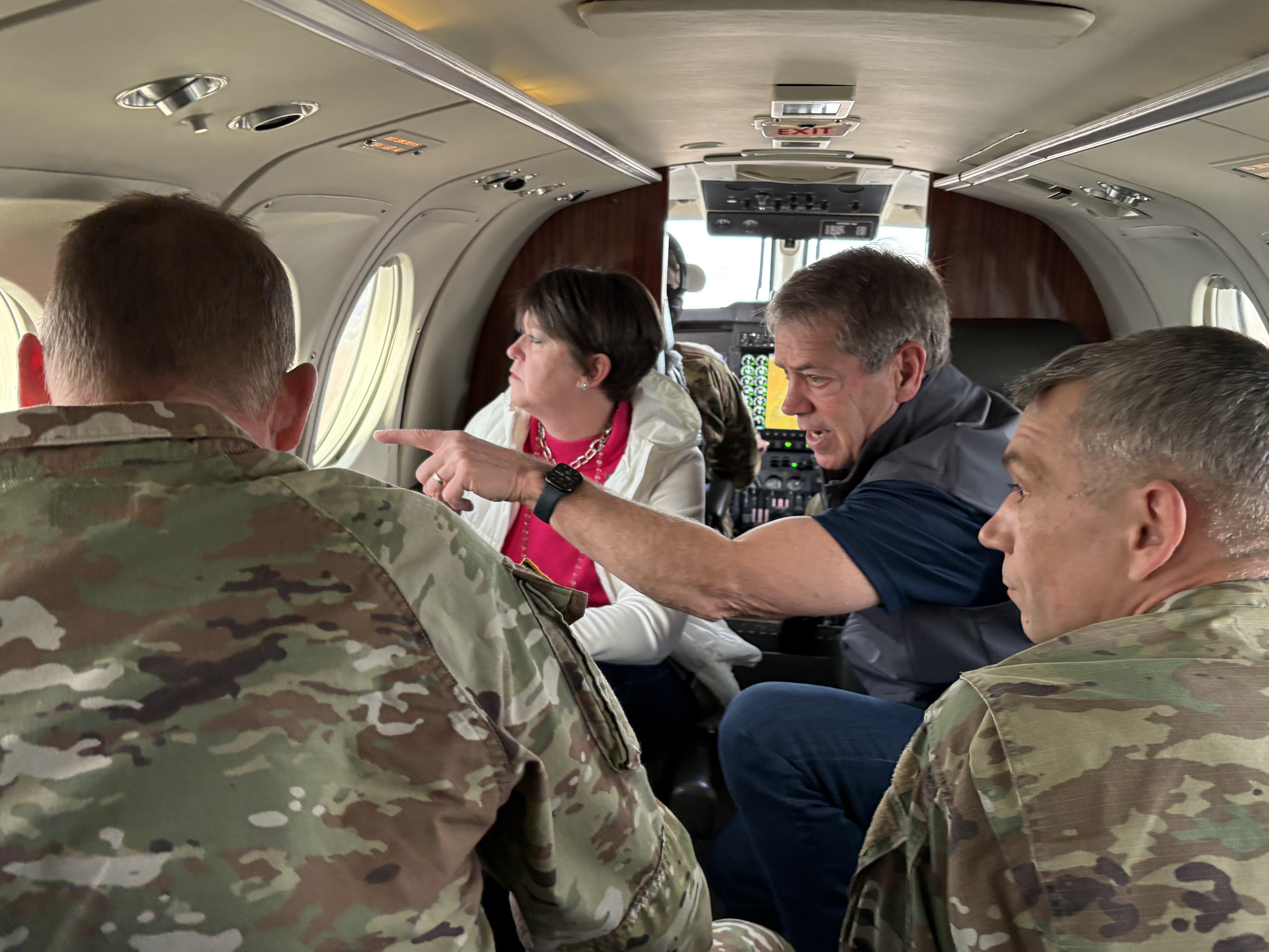 Governor Jim Pillen, Major General Craig Strong, adjutant general for the Nebraska National Guard, and Laura Field, executive vice president of the Nebraska Cattlemen viewed the Cottonwood Fire from the air.