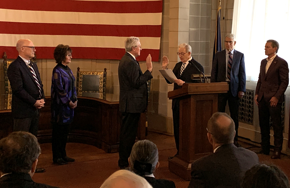 Secretary of State Bob Evnen administered the oath of office to the senator-elect, who was joined by his wife Kay and Speaker of the Legislature John Arch.
