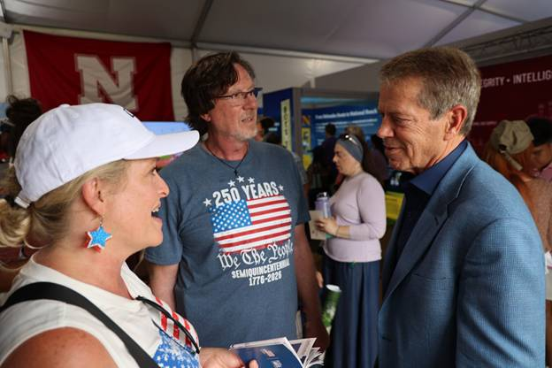 Gov. Pillen greets visitors to Nebraska pavilion 
