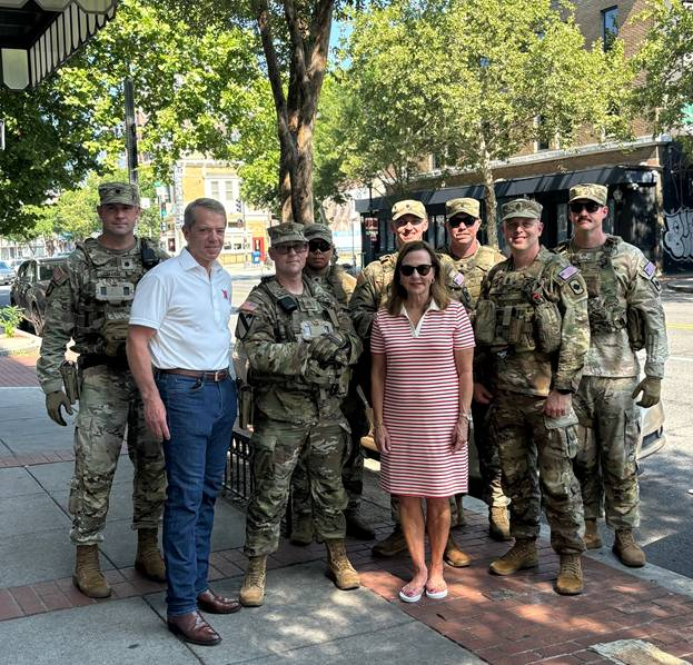 Gov. Pillen &amp; First Lady Suzanne pose with National Guard members in D.C.