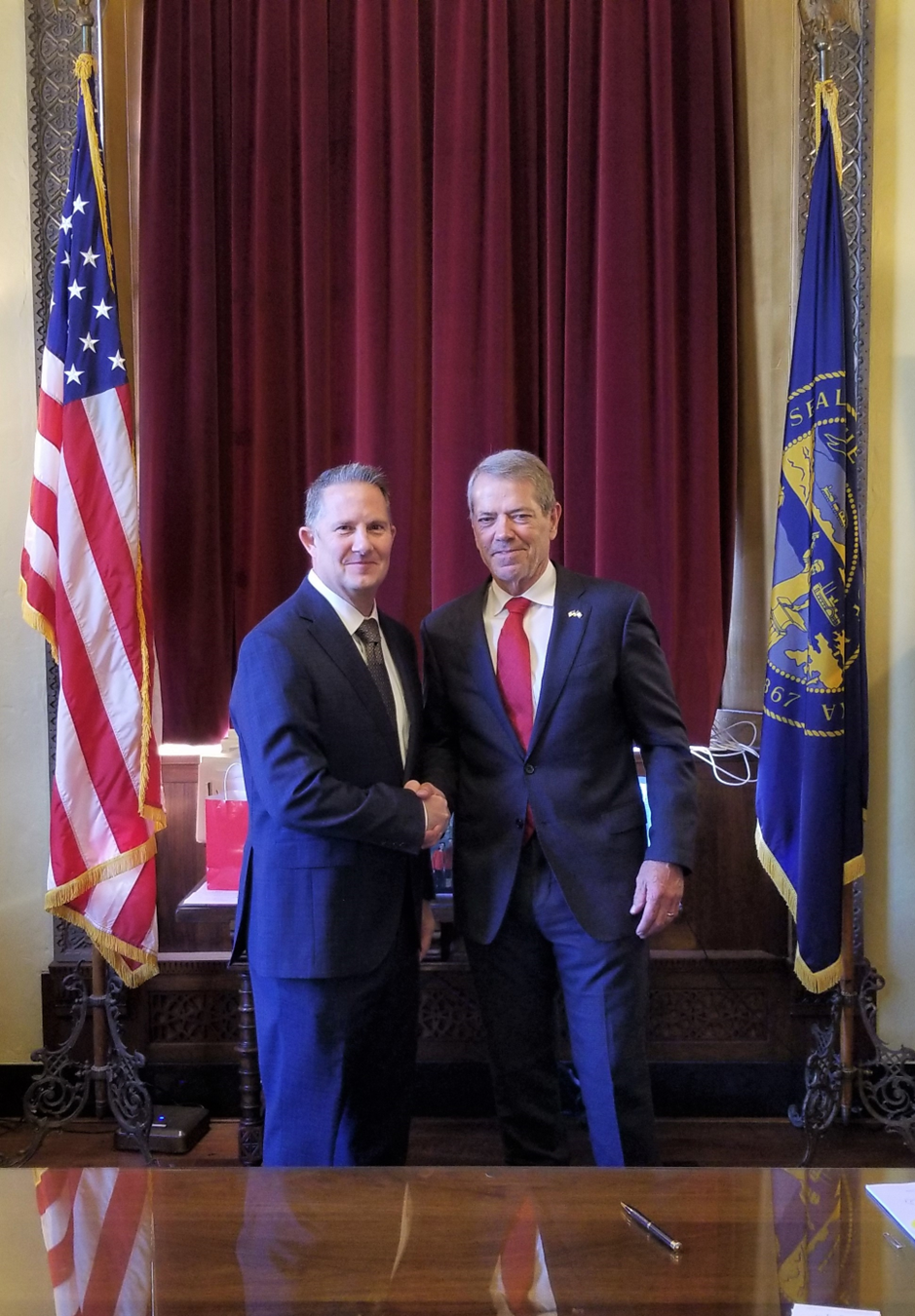 Newly appointed Chief Justice Jeffrey J. Funke with Gov. Jim Pillen