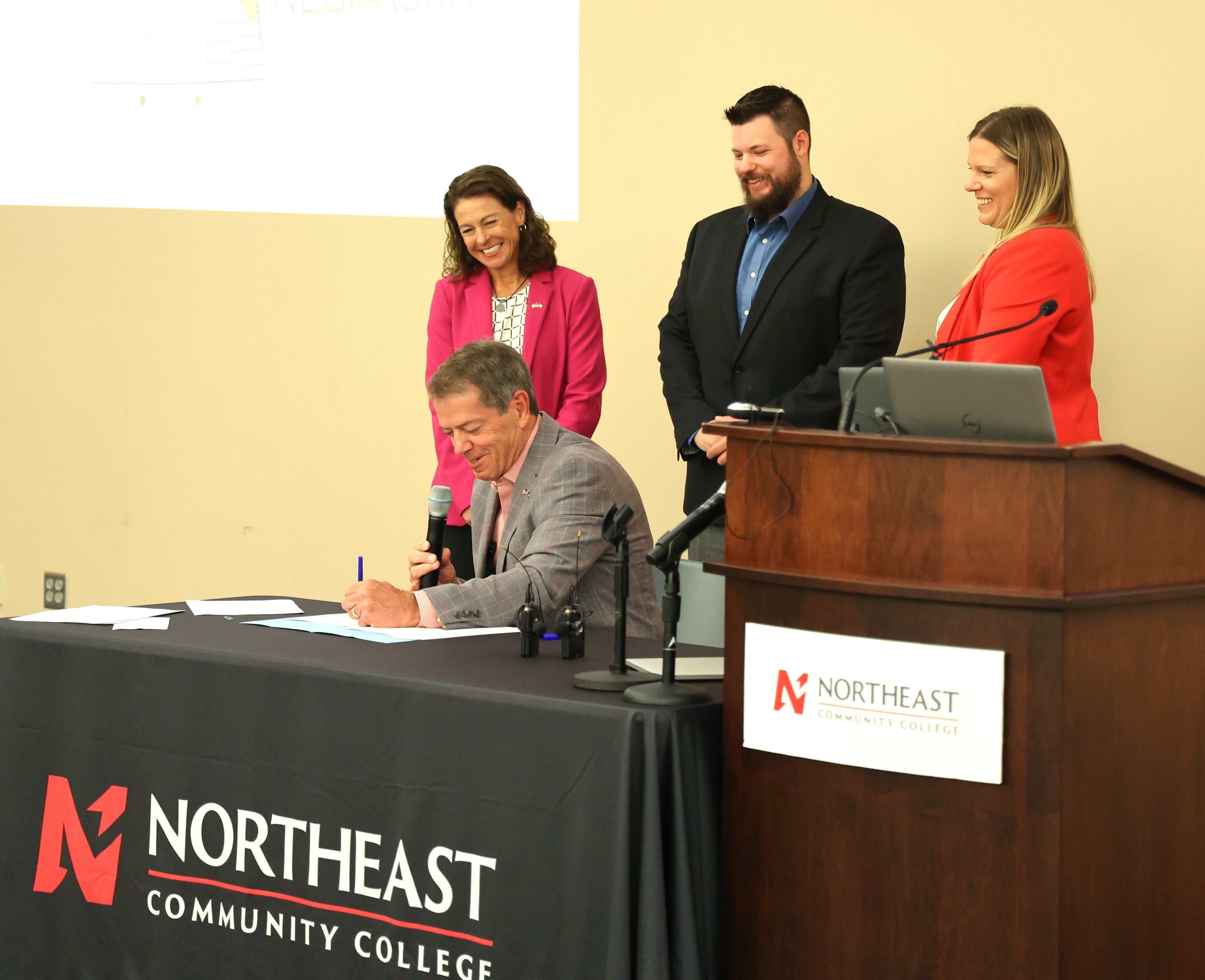 Gov. Pillen; DED Interim Director Maureen Larson;  Doug Rood, vice chair of workforce for NeMAC, Katie Thurber, commissioner, NDOL