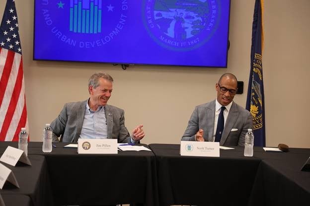 Governor Jim Pillen and HUD Secretary Scott Turner chat during the Opportunity Zones and Workforce Housing Listening Session