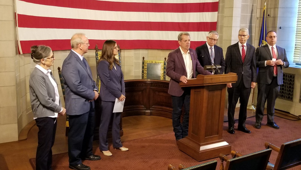 Left to right: Elizabeth Jacobs-Fitzgerald, Dr. Robert Plambeck, Marcy Penrod, Gov. Pillen, Dr. Tim Tesmer, Lt. Gov Kelly, Dr. Richard Wurtz