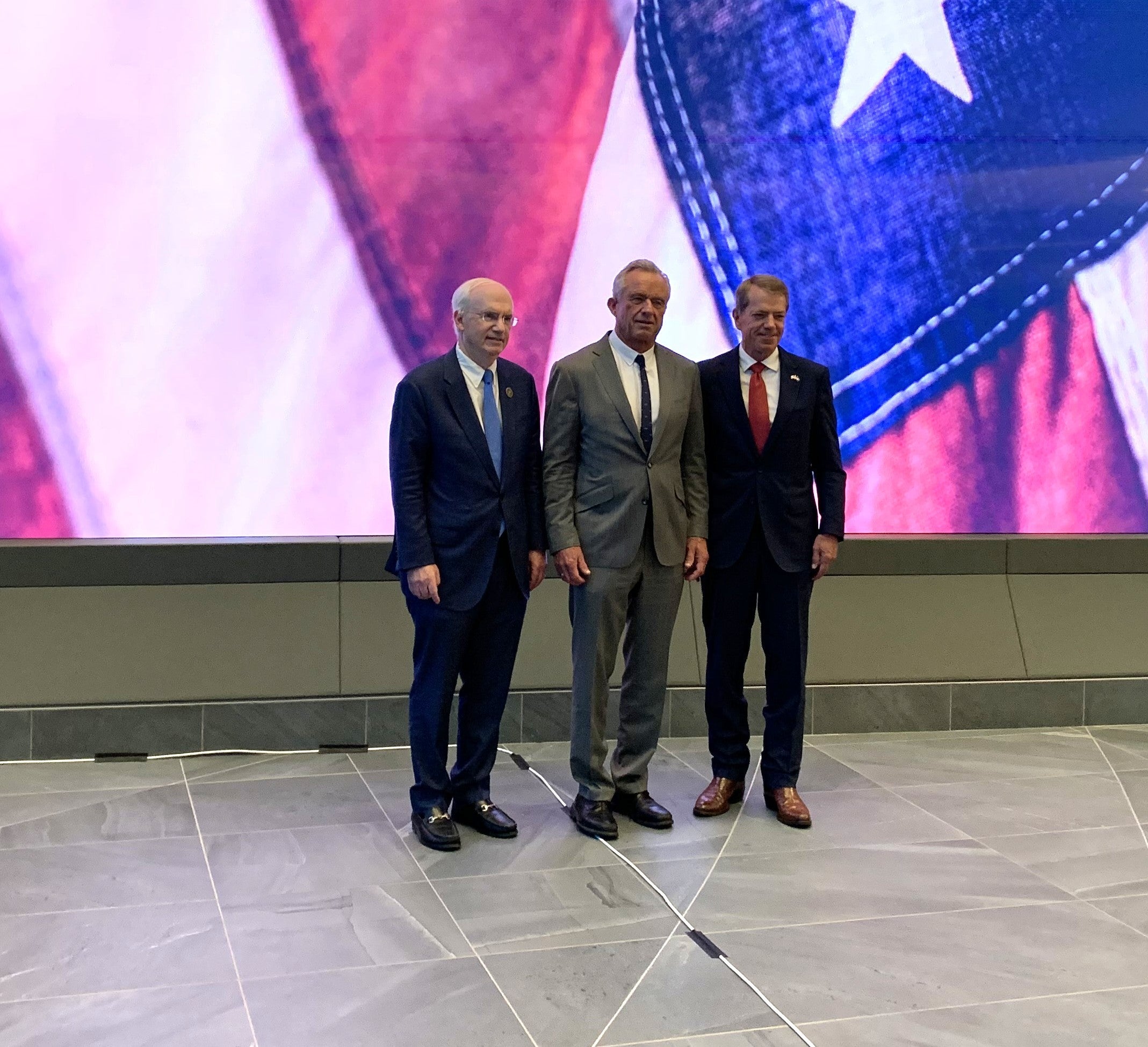 Dr. Gold, Sec. Kennedy &amp; Gov. Pillen pose for photos prior to news conference