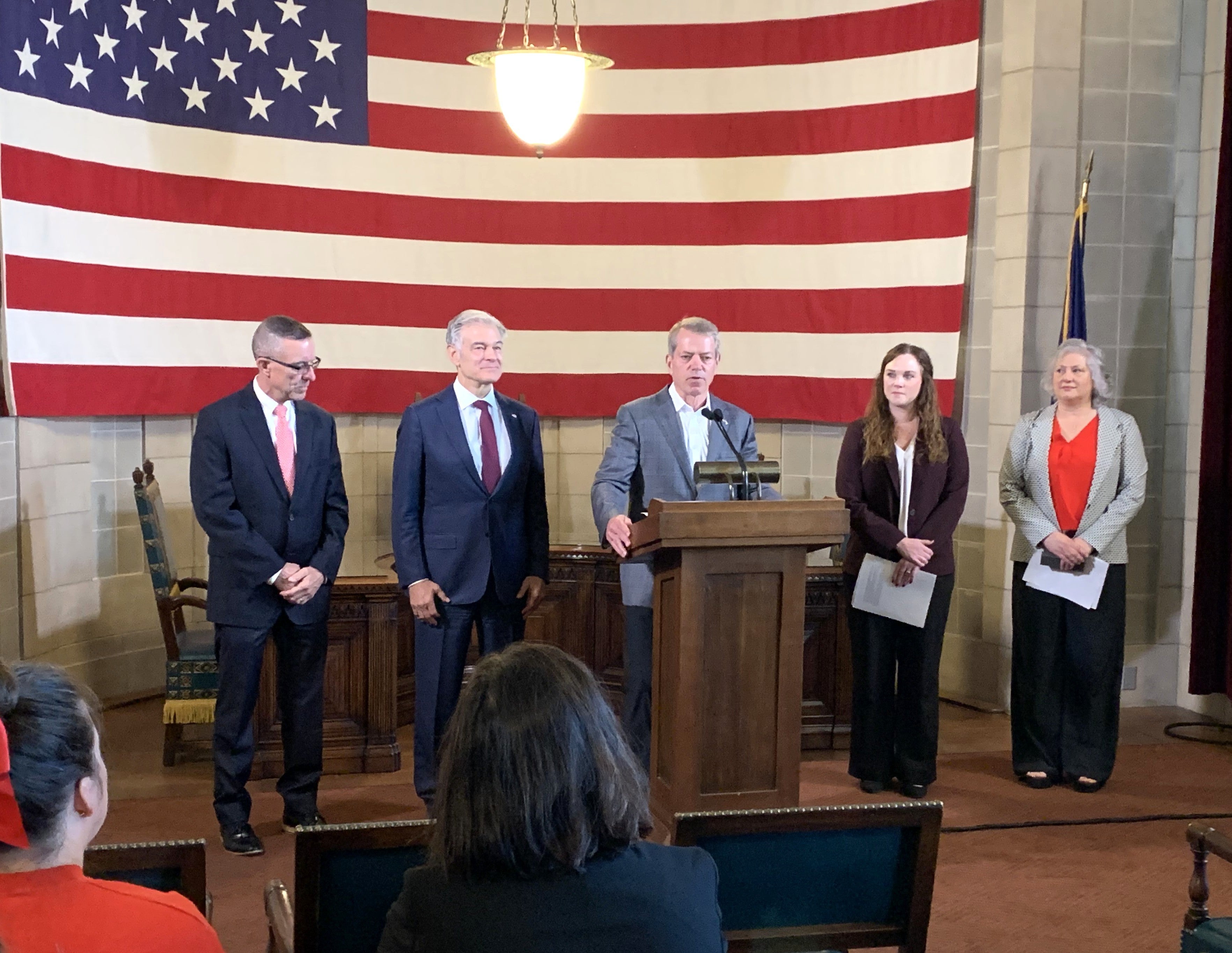Gov. Pillen speaks at news conference updating successful award of $177 million in RHTP funding. He is joined by Dave Randolph, Dr. Mehmet Oz, Ashley Newmyer, and Laura McDougall.