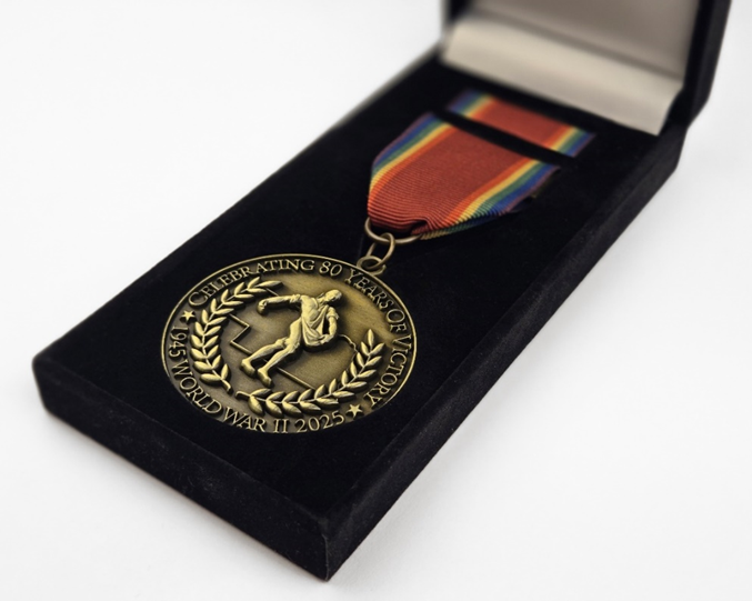 front side of the medal, ribbon bar, and box