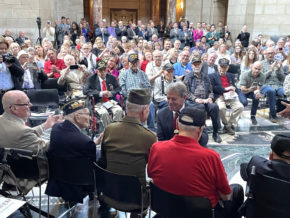 Governor Pillen greets WWII Veterans