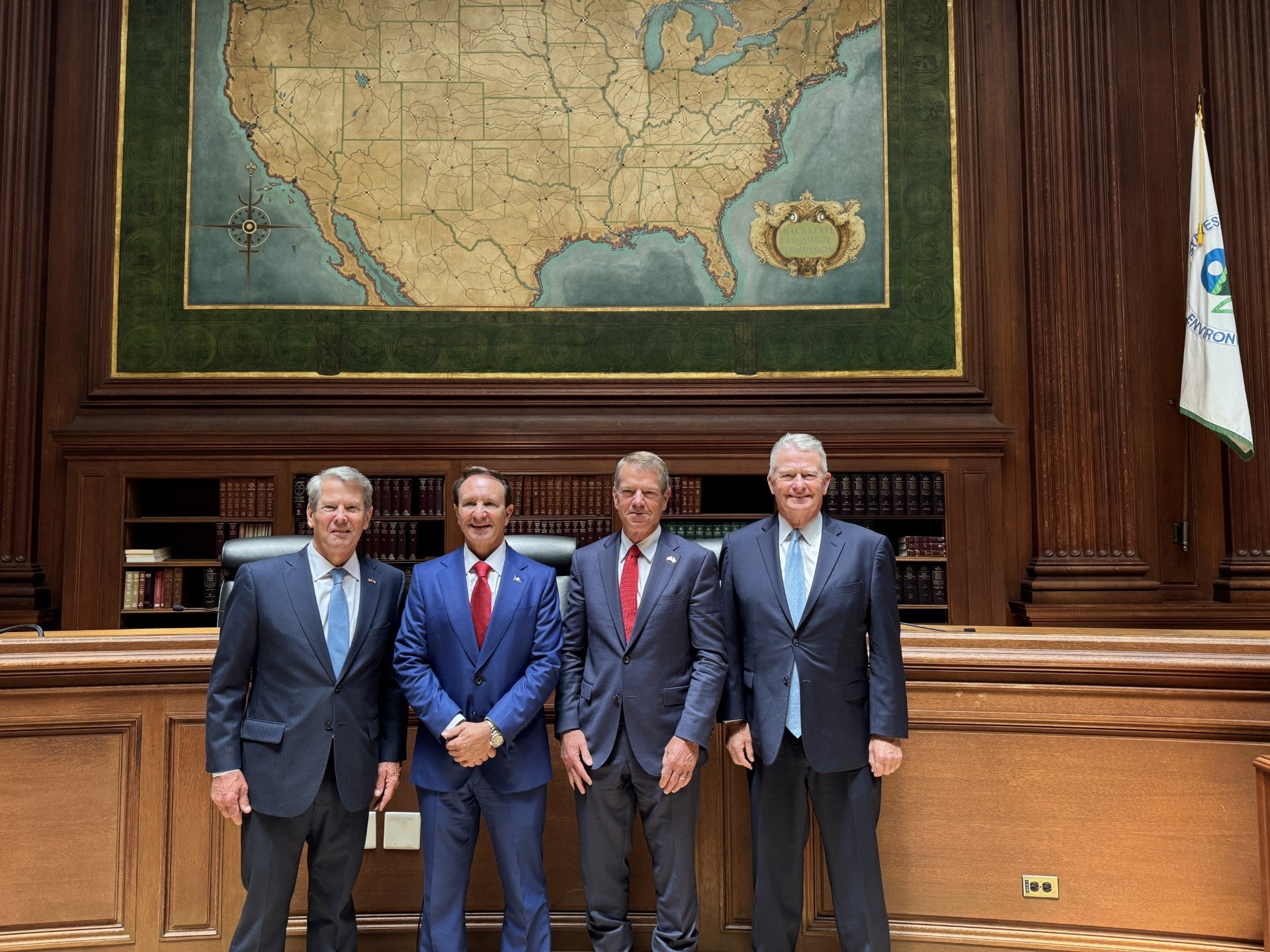 Gov. Pillen with Louisiana Governor Jeff Landry, Idaho Governor Brad Little, and Georgia Governor Brian Kemp. A map of the United States hangs on a wall in the background.