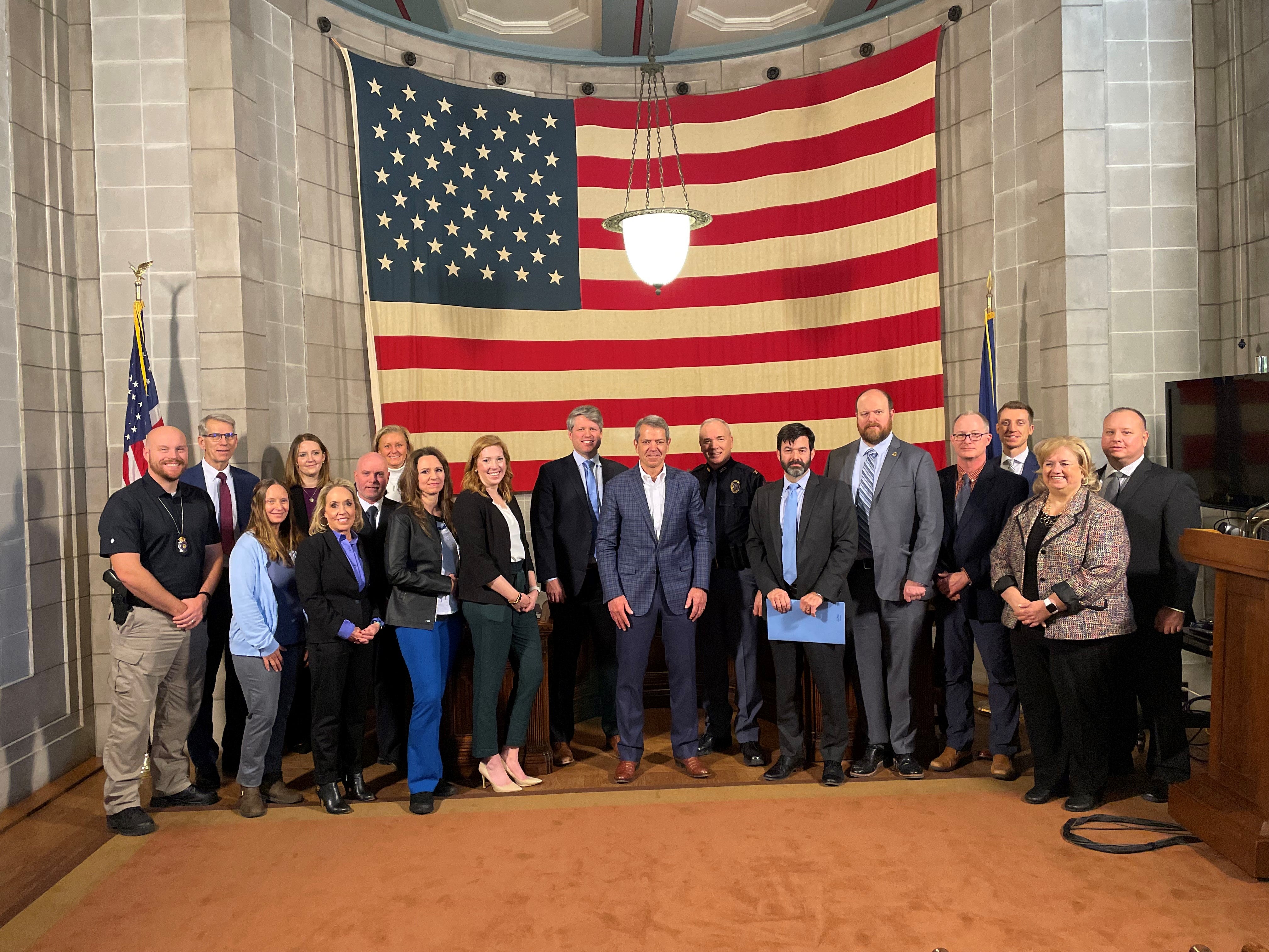 Pictured are Governor Jim Pillen, Lieutenant Governor Joe Kelly, Colonel John Bolduc, members of the Attorney General's Human Trafficking Task Force, and representatives of various agencies and organizations combatting human trafficking.