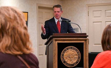 Gov. Pillen addresses Guard military members and their spouses at the Governor’s Residence