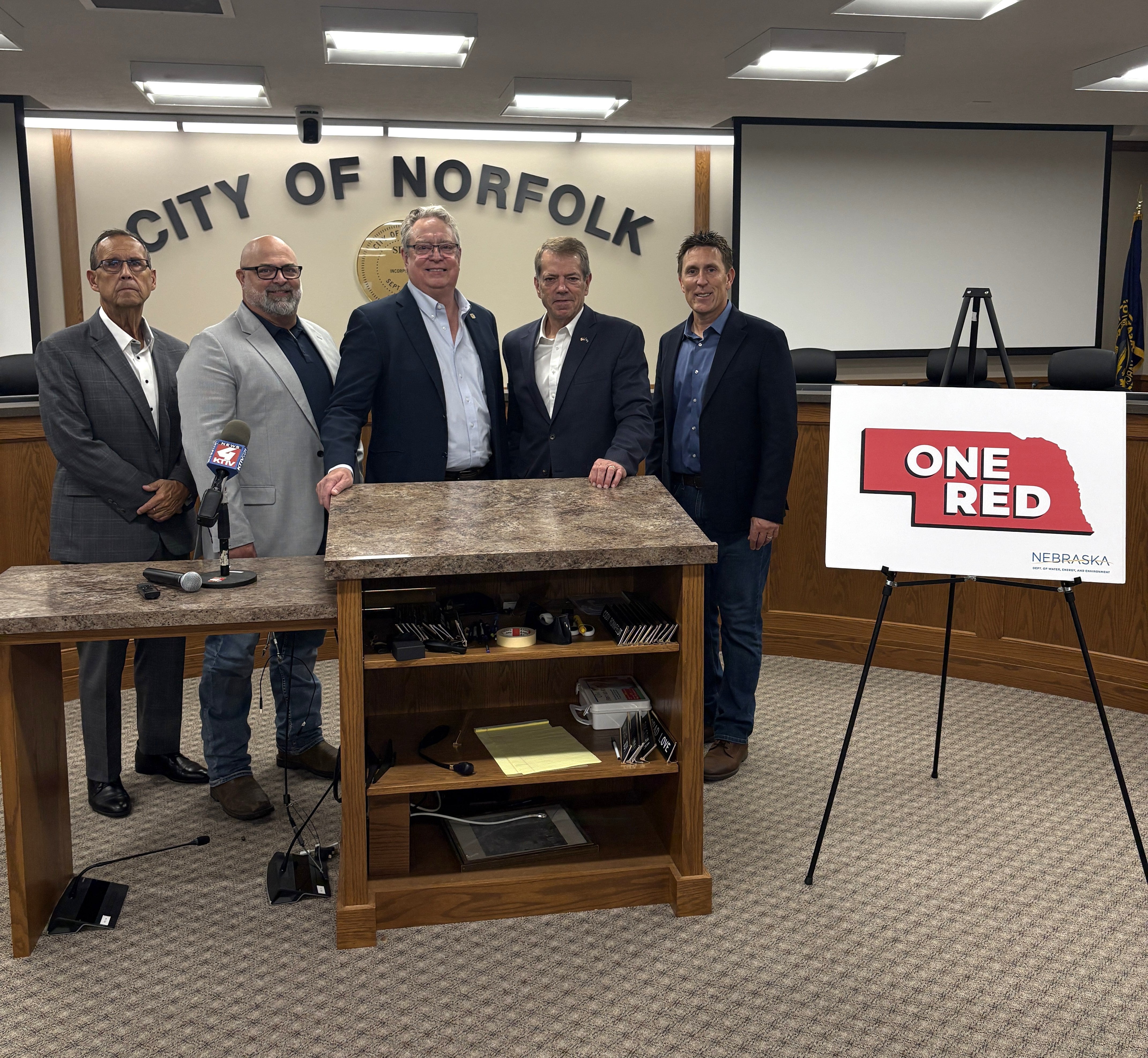 Governor Jim Pillen held a press conference in Norfolk to highlight a wastewater infrastructure project that plans to use ONE RED funding. Pictured are, from left: Norfolk City Administrator Scott Cordes, Norfolk Mayor Shane Clausen, Senator Robert Dover, Governor Jim Pillen, and Department of Water, Energy, and Environment Director Jesse Bradley.